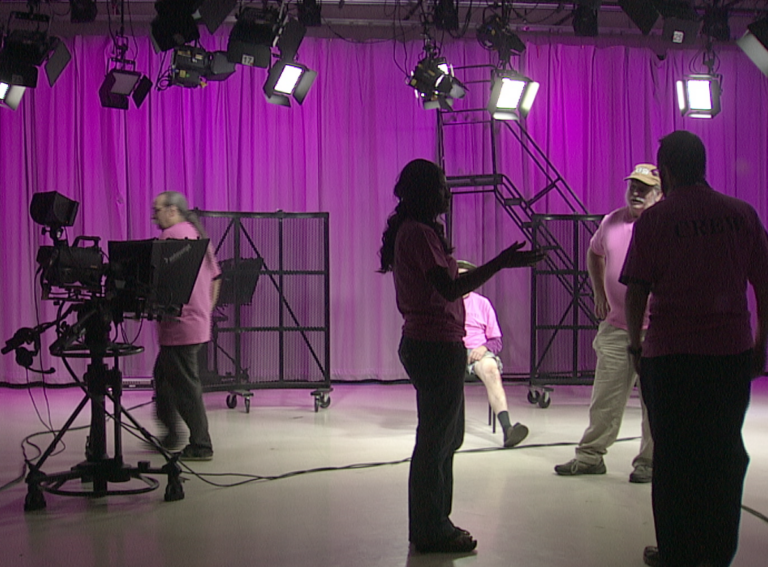 Behind the scenes image on the set of an episode of The Reel Nurses TV show.